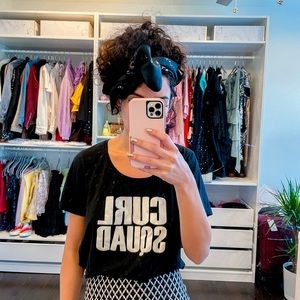 Black T-shirt curly hair